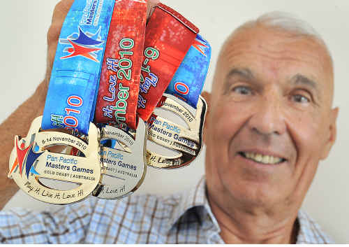 Christian Thiess with the three medals he won in the Pan Pacific Masters Games on the Gold Coast. Christian Thiess with the three medals he won in the Pan Pacific Masters Games on the Gold Coast.